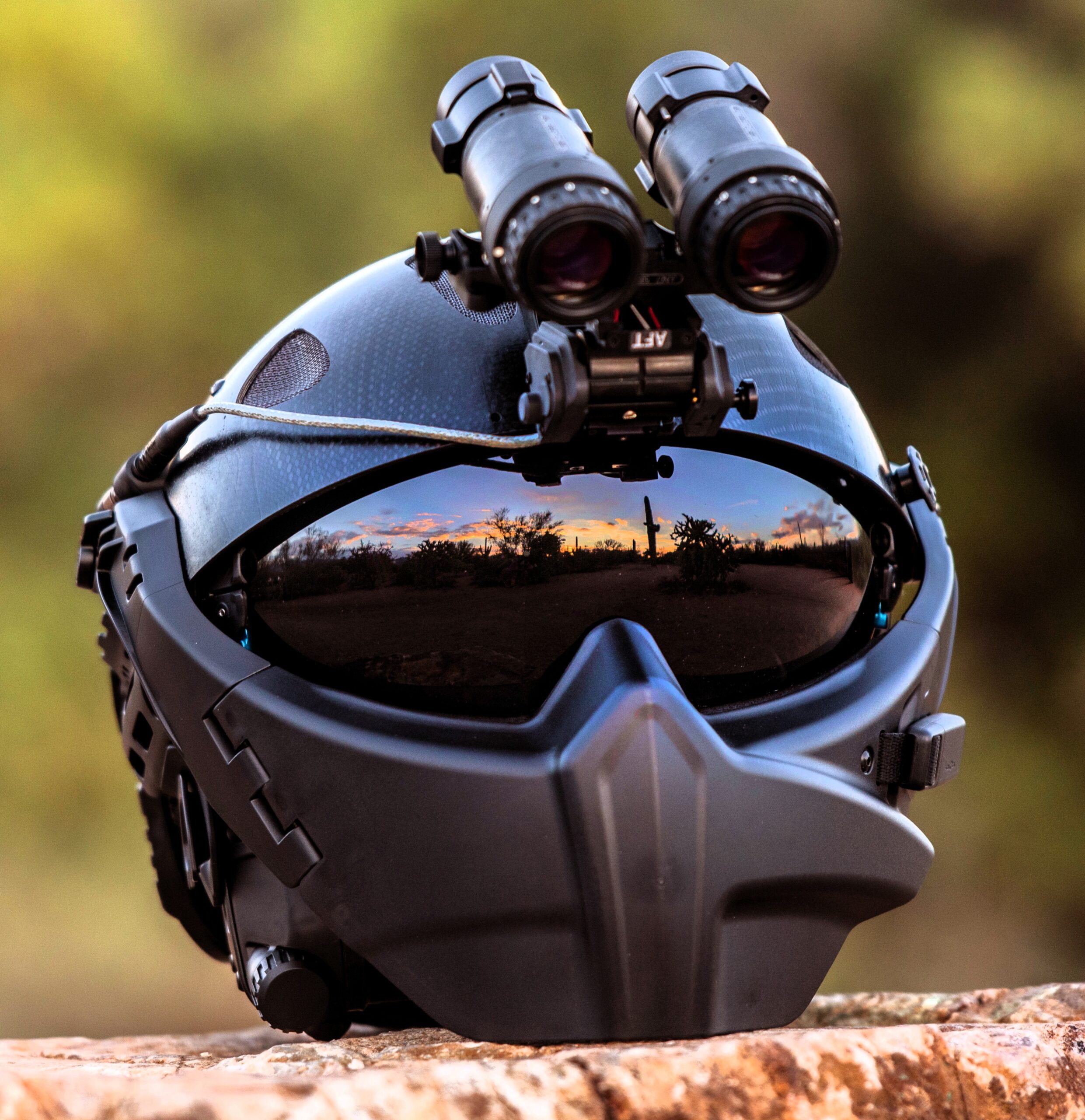 RATH rotary-wing tactical helmet front view with dual-tube night vision goggles and ballistic visor