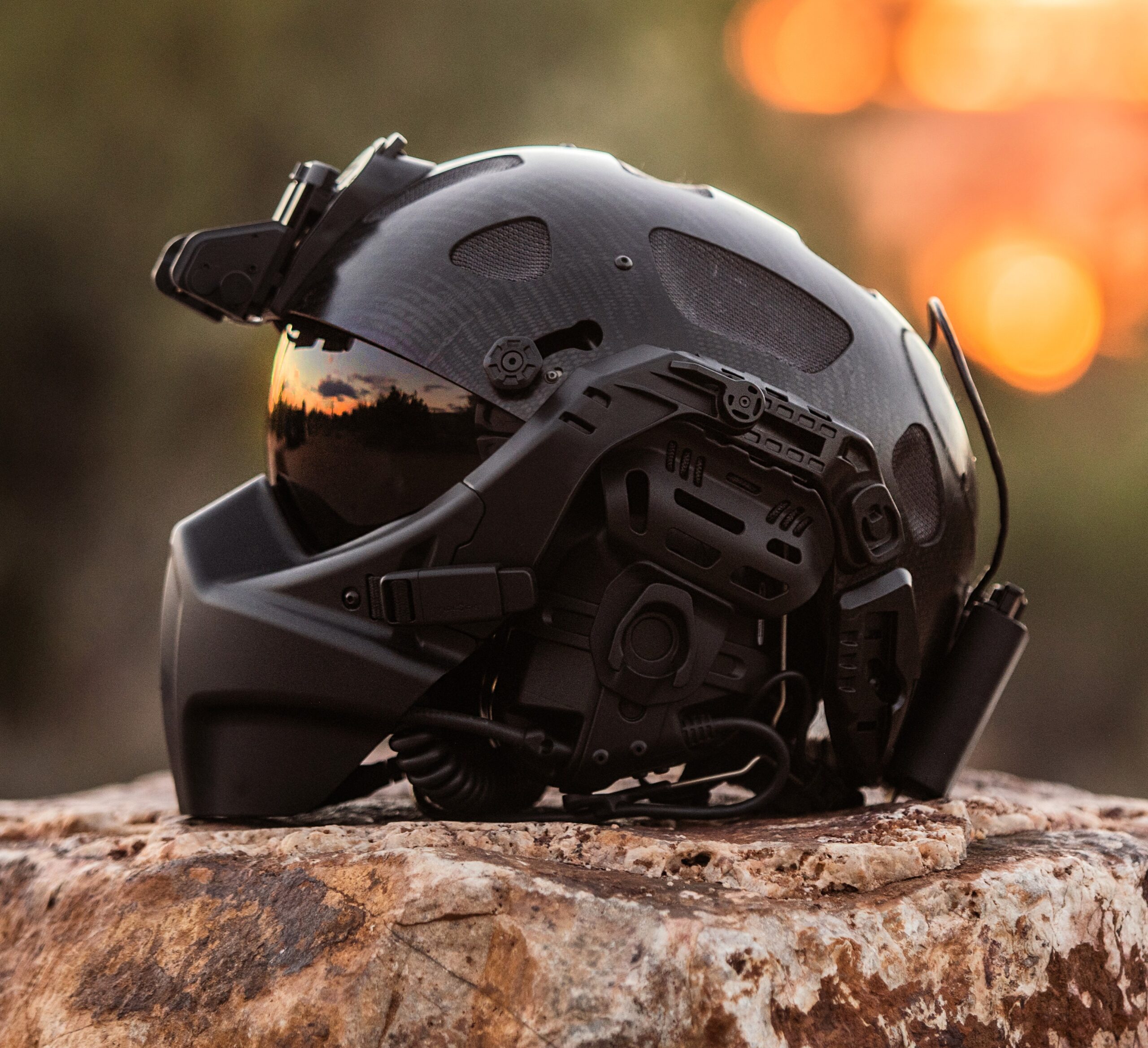 RATH rotary-wing tactical helmet profile view with ballistic visor and integrated communications